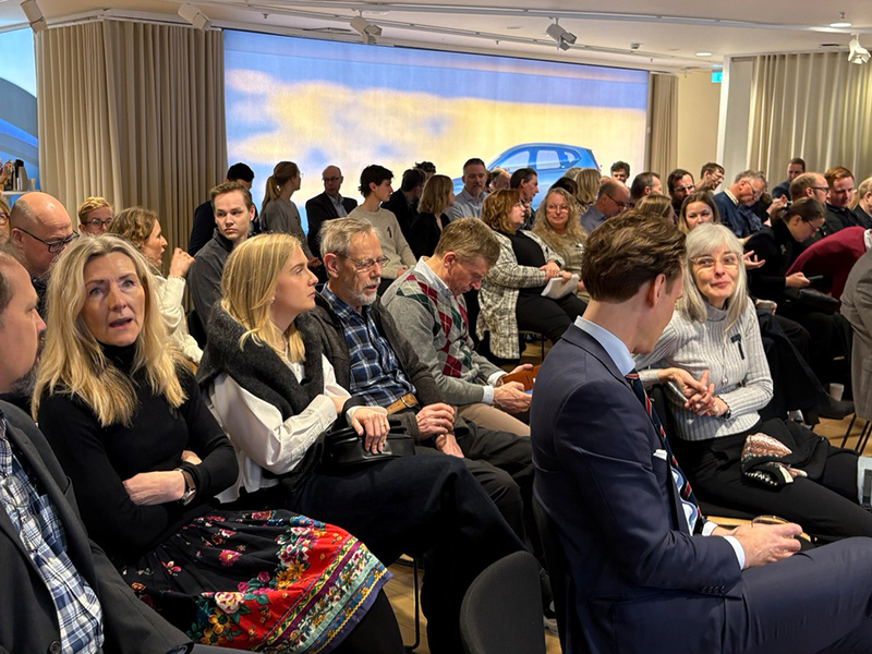 Människor i en konferenslokal